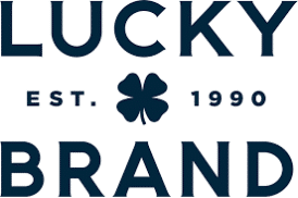Logo with "Lucky Brand" in bold text, "Est. 1990" beneath, and a four-leaf clover symbol in the center.