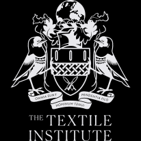 Black and white emblem of The Textile Institute featuring two birds, a globe, and a shield with Latin inscriptions "Omnia Sunt Pendenta Filo" and "Hominum Tango.