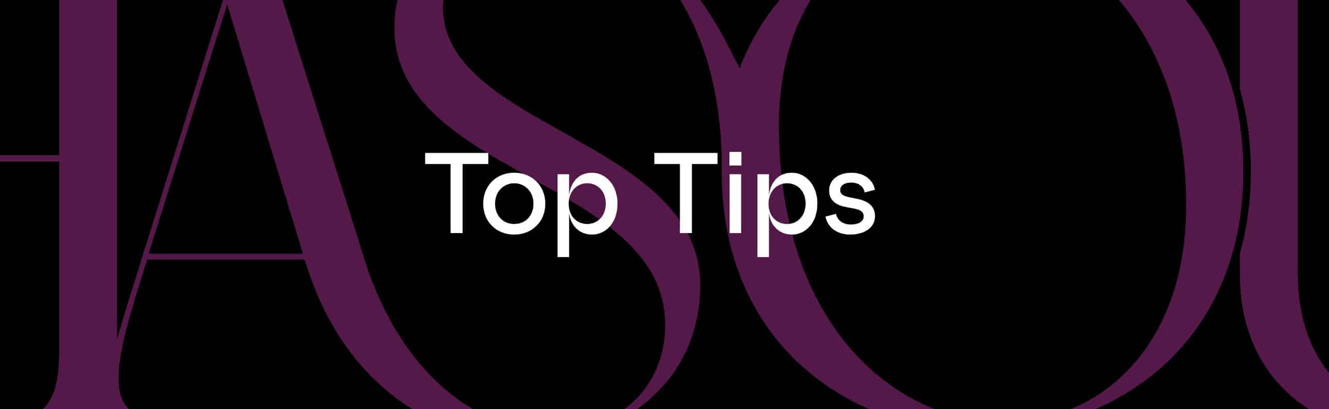 White text reading "Top Tips" is centered on a black background with large, partially visible purple letters in the background.